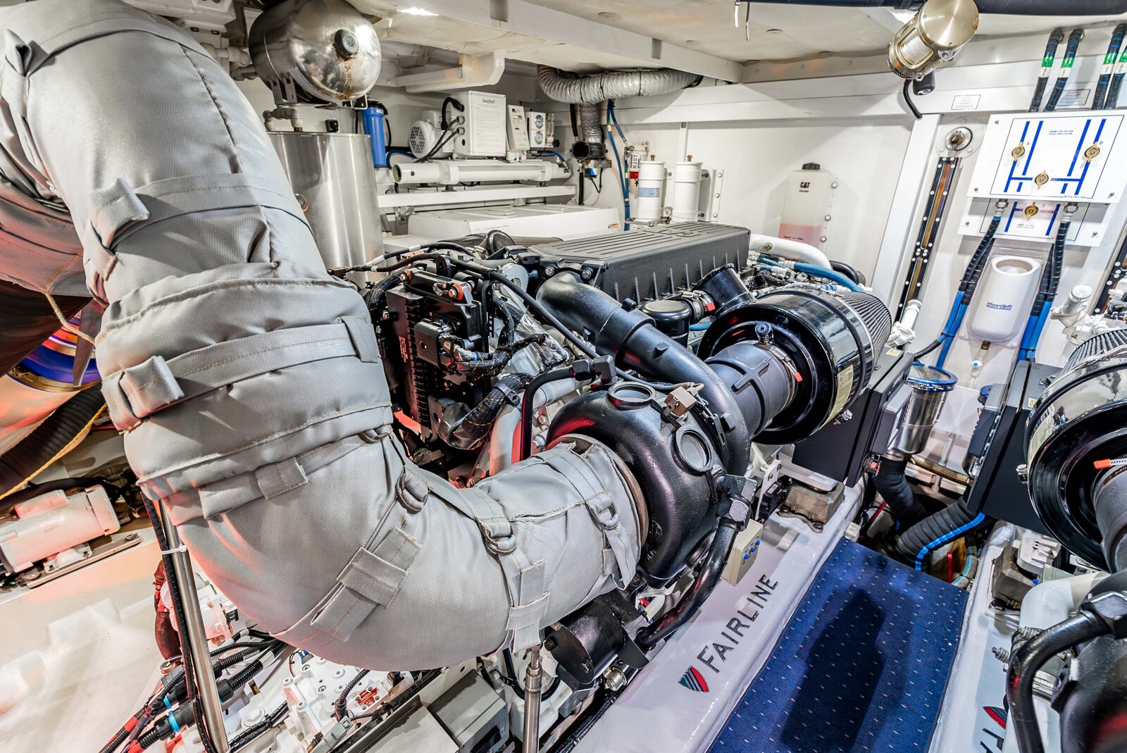 Immaculate engine room of Sea Hammock with twin Caterpillar C-32 engines under 800 hours