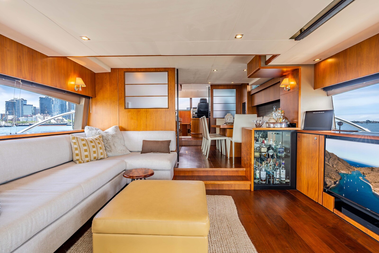 Main salon of Fairline Squadron 78 Sea Hammock with new suede headliners and walnut joinery