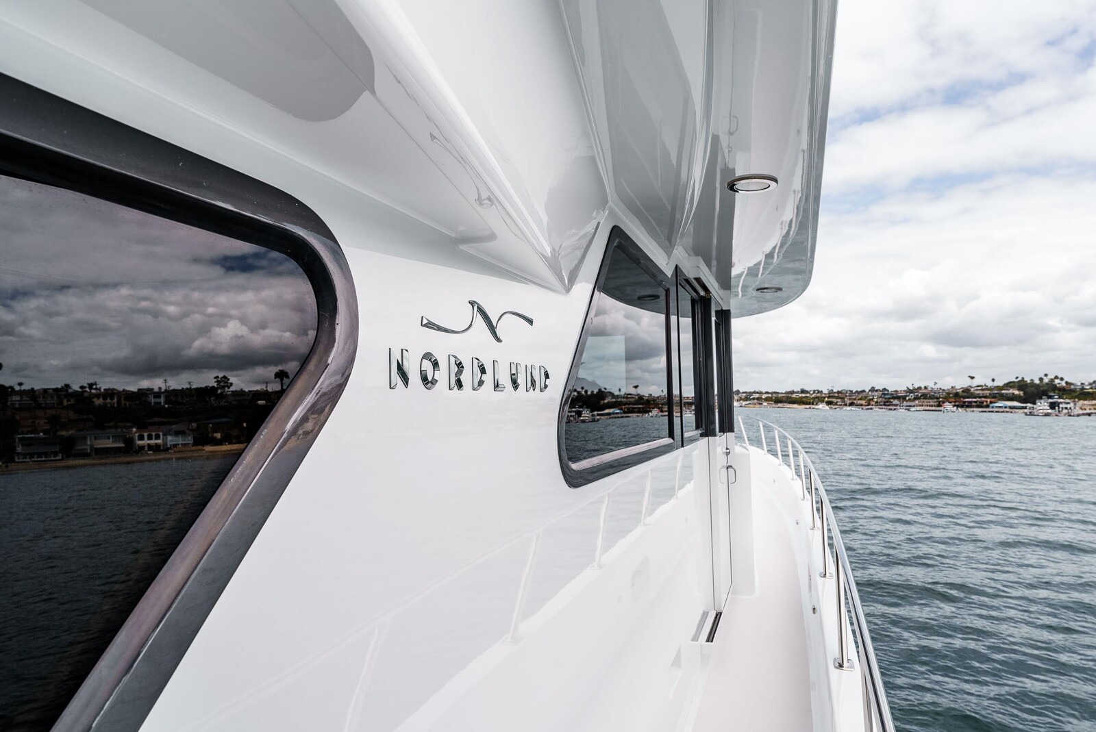 Nordlund builder marque detail on the superstructure of Following Sea II