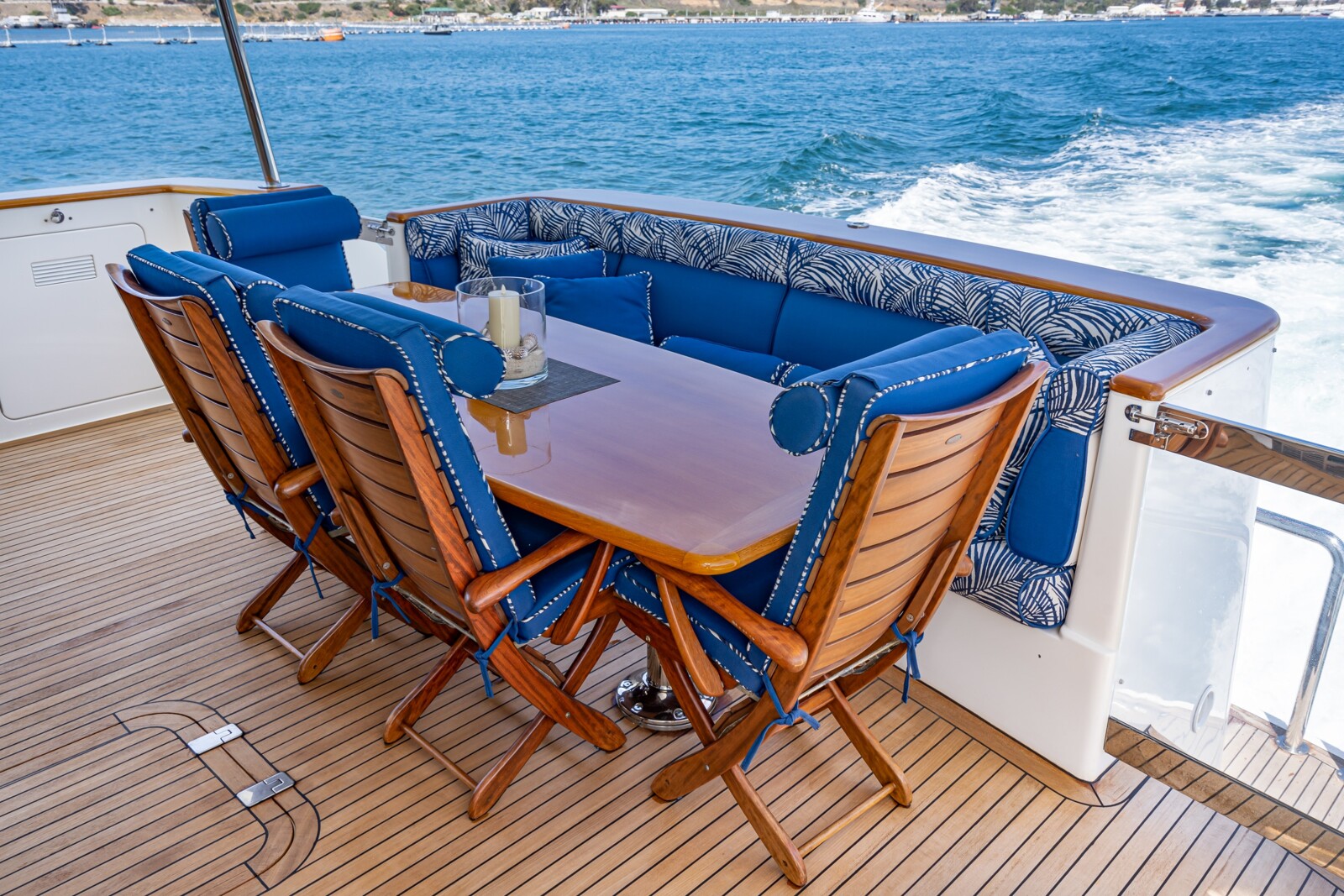 Teak aft deck with alfresco dining aboard West Bay SonShip 78 Mahana