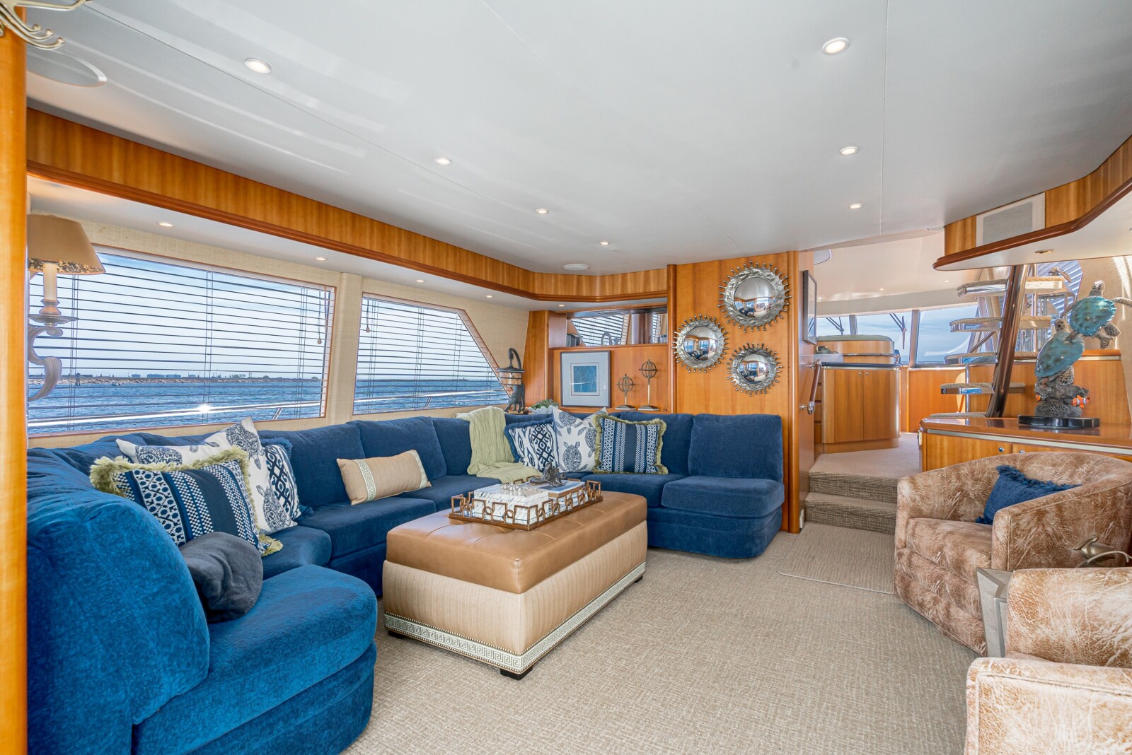 Main salon of West Bay SonShip 78 Mahana in rift-cut American cherry, interior by Cary Vogel